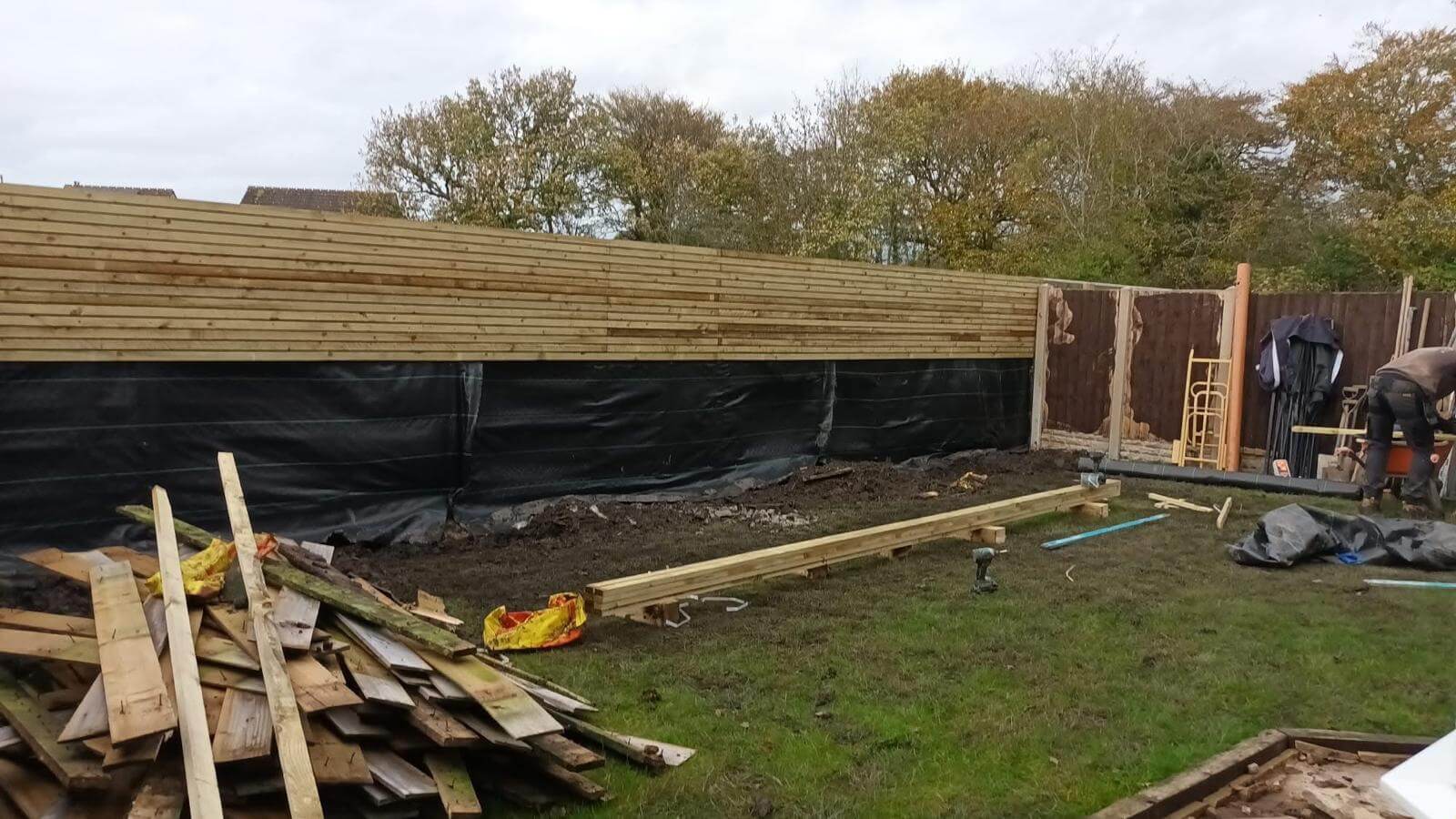 Timber fence being constructed